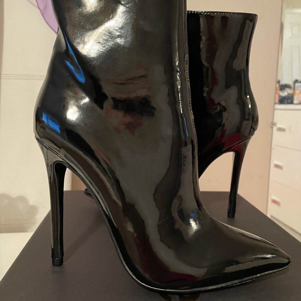 Bebe Weapon liquid patent bootie , size 7